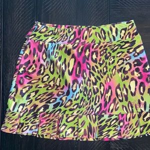 TzuTzu athletic skort in multi color cat pattern, back pocket